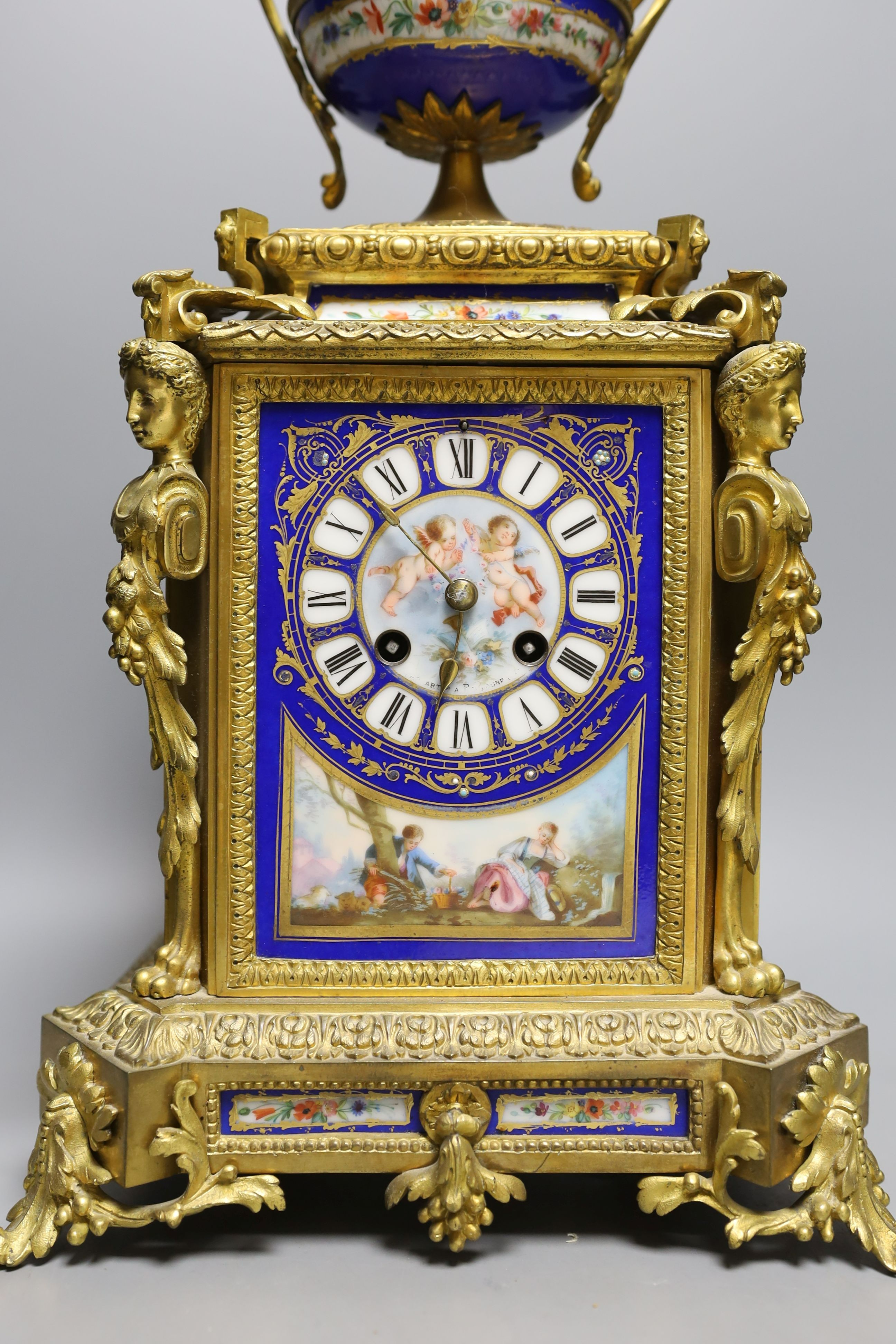 A late 19th century Sevres style porcelain and ormolu mounted mantel clock 42cm